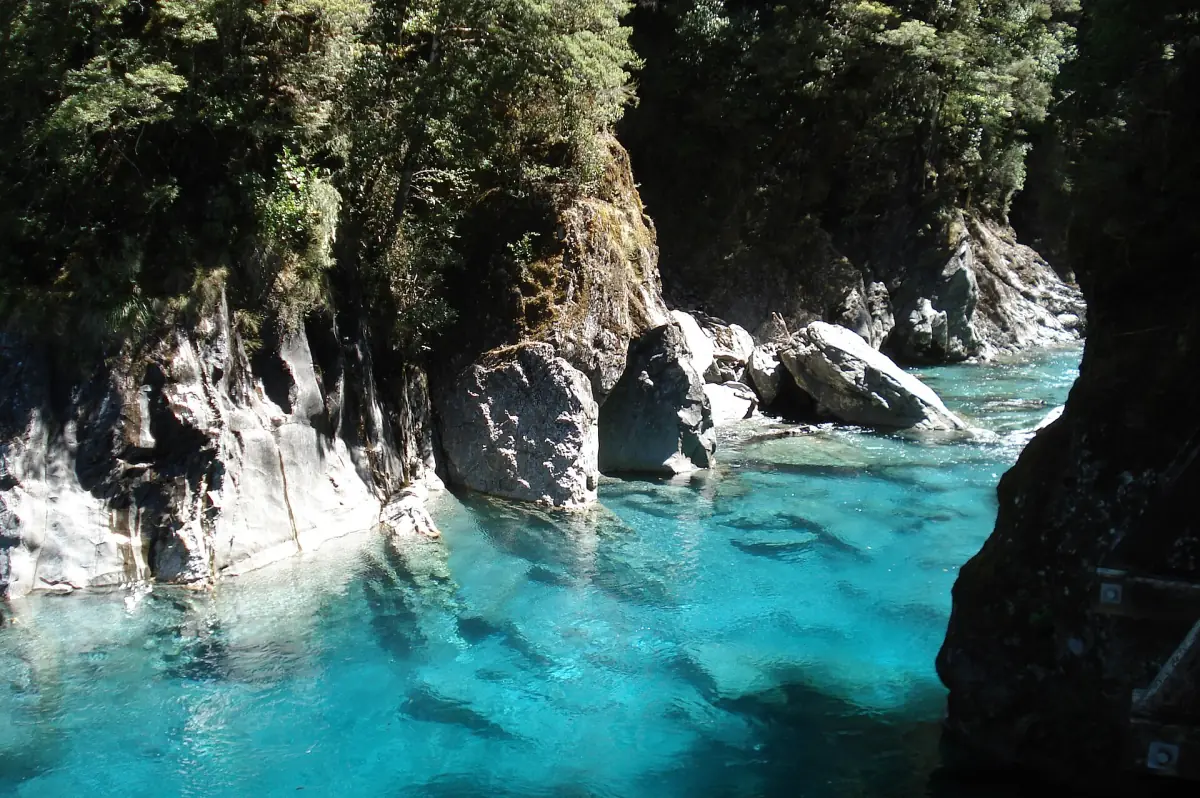 Clear blue water in the rock gorge of the Blue Pools