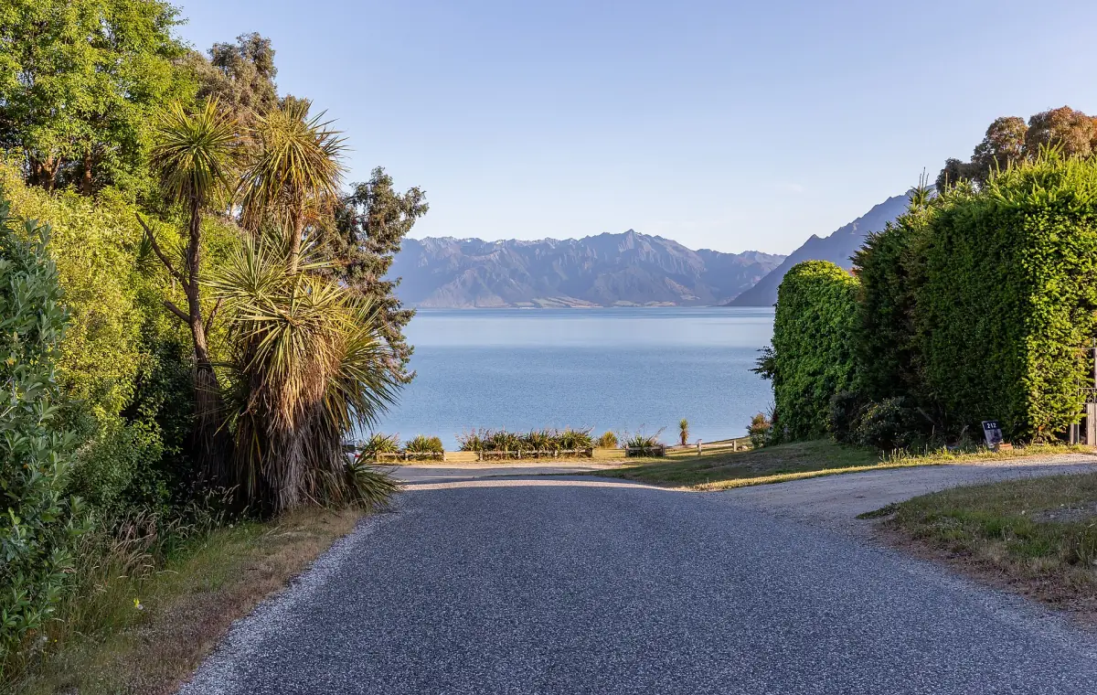 Lake Hawea seen from a quiet street in Hawea