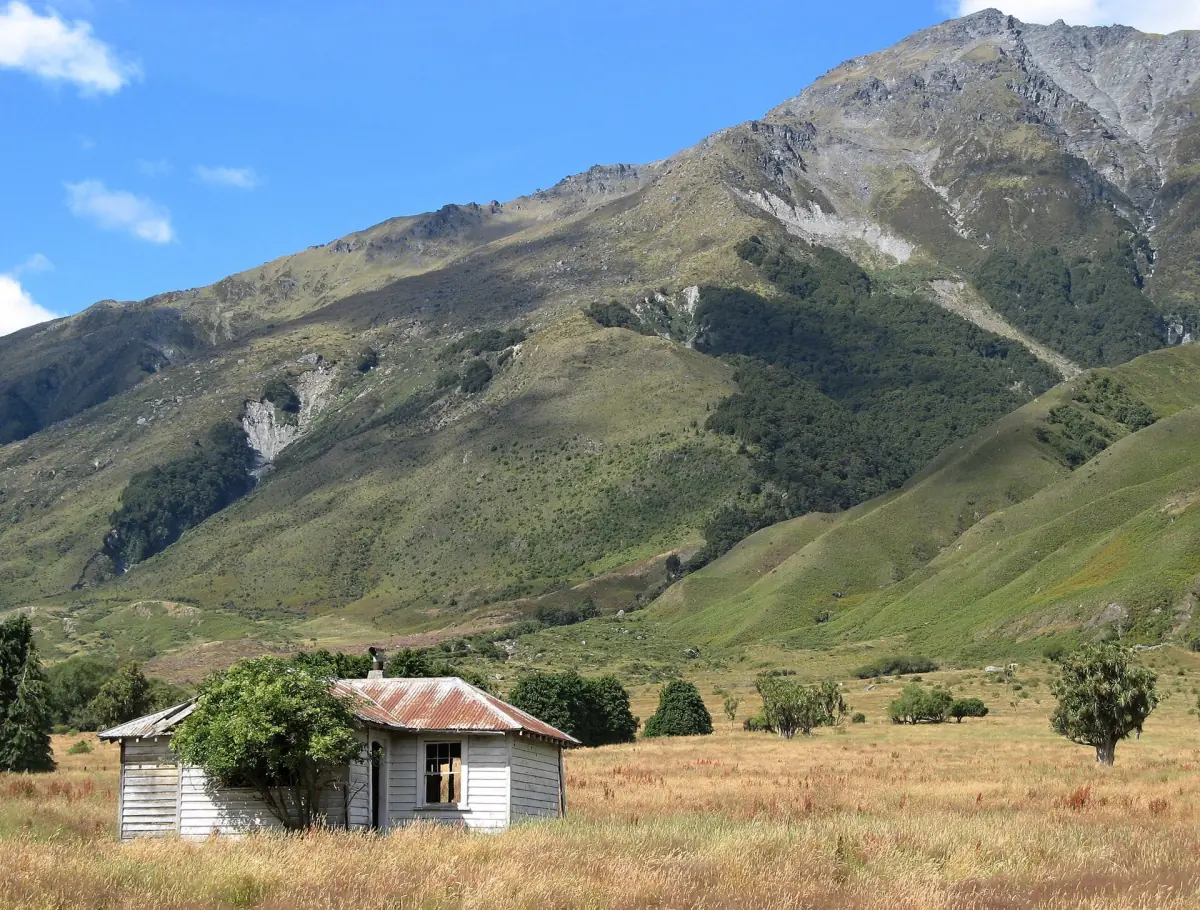 An old cottage below the mountains at Makarora
